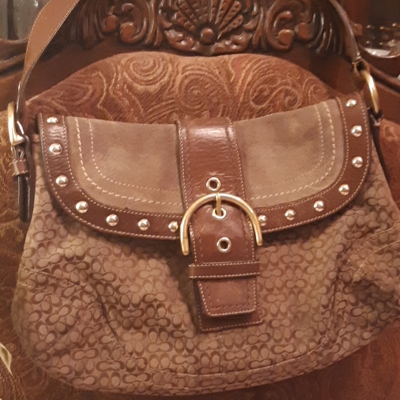 Coach Handbags - A medium size Coach purse, used.